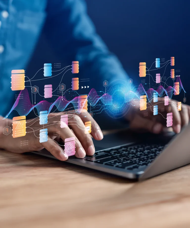 Software consultant analysing data on a laptop - software consulting services
